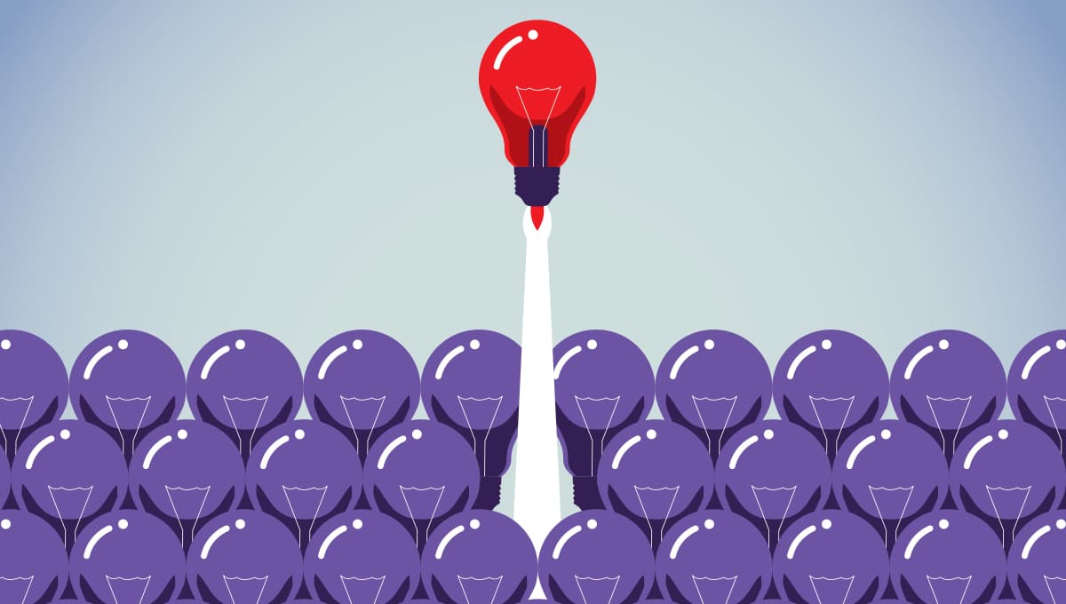 Illustration of many purple lightbulbs, with a red lightbulb taking off like a rocket from the centre