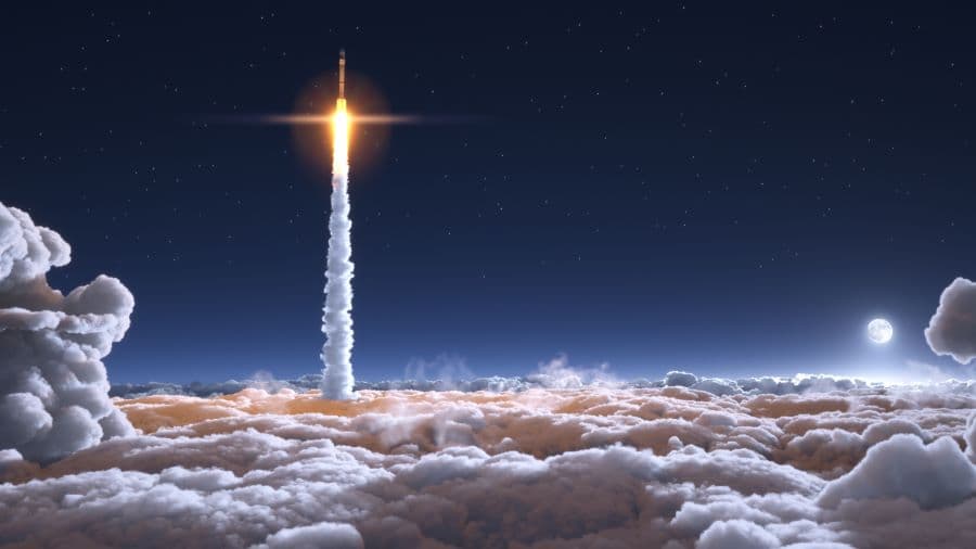 Photo illustration of rocket in space.