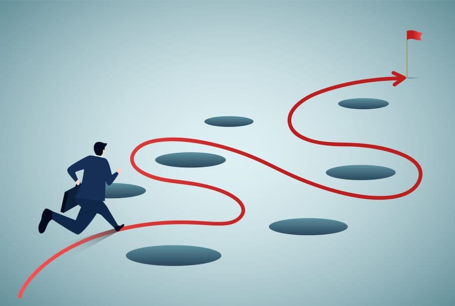 Illustration showing man avoiding pitfalls.