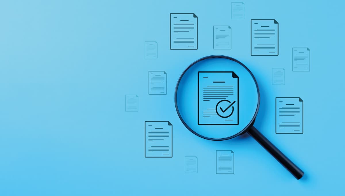 magnifying glass on note