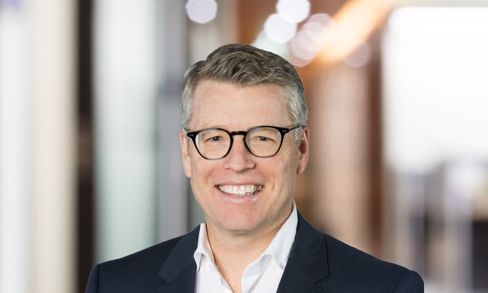 Headshot of Todd Bright, Partners Group