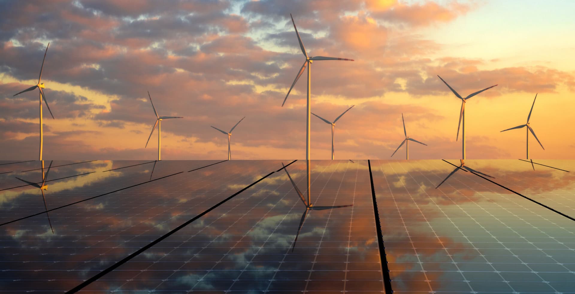 clean energy concept, photovoltaic panels and wind turbines in the light of the rising sun