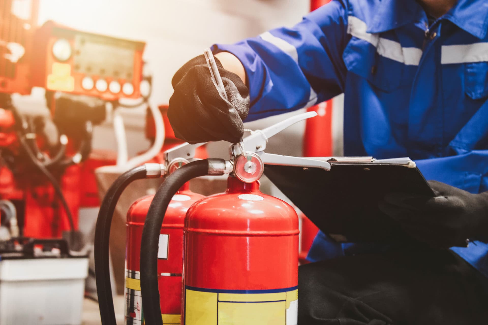 Engineer check fire suppression system,check fire extinguisher tank in the fire control room for safety. (Getty Image)