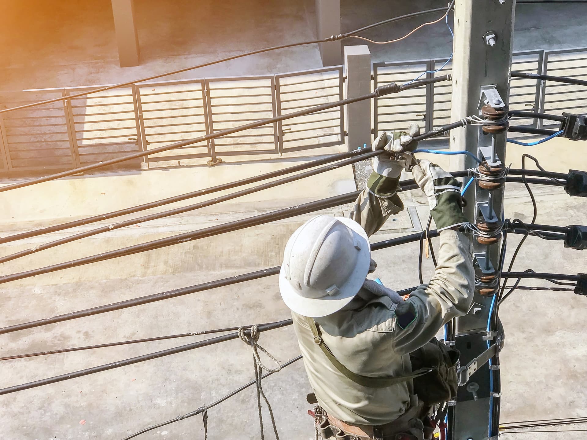 Electricians are climbing on transmission lines