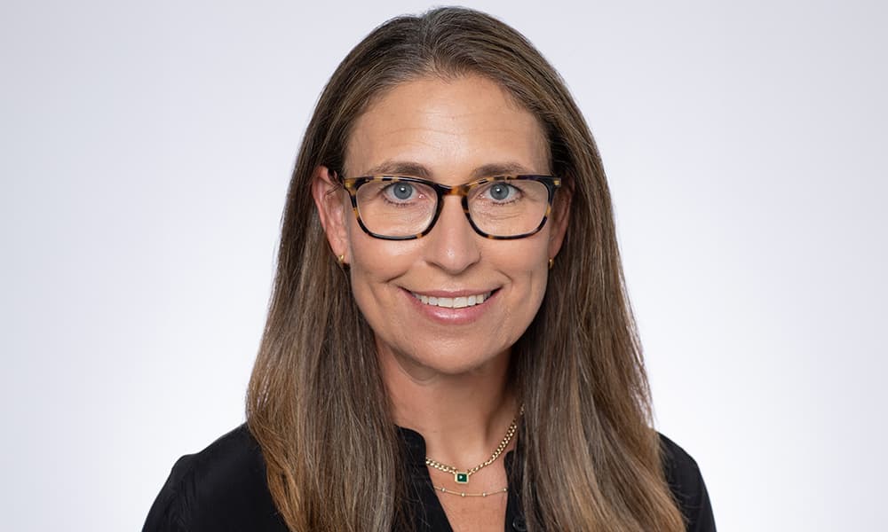 Headshot of Ashley Marks, co-founder of Cordillera Investment Partners, on a netural background