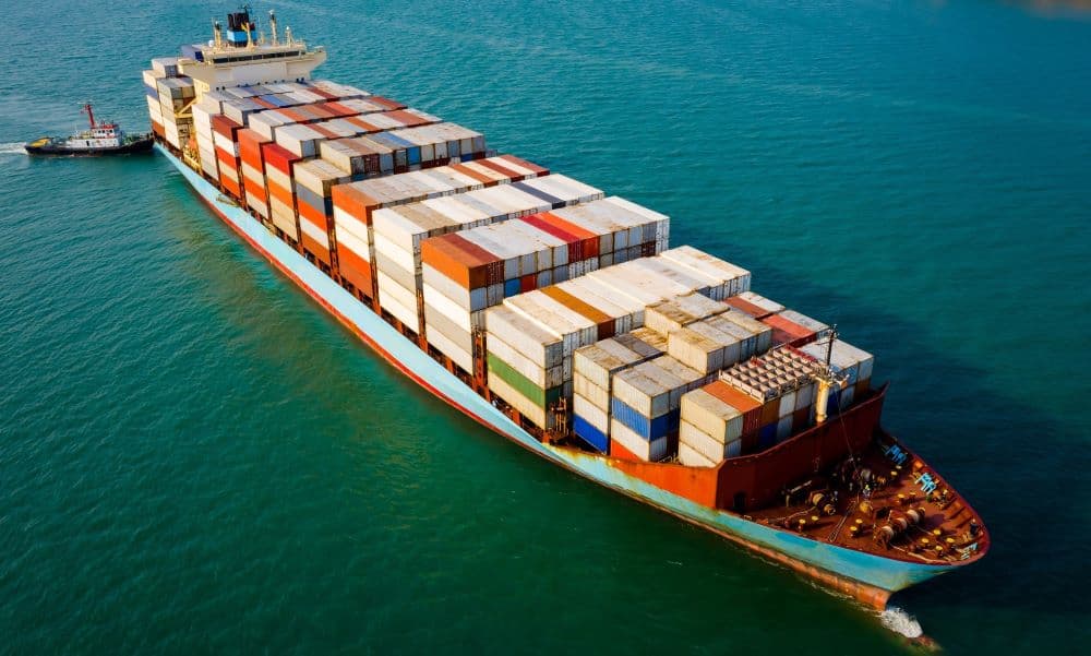 A ship with cargo on the water.