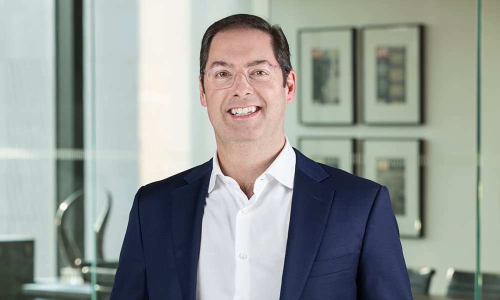 Image of Neil McMahon of Kimmeridge in an office