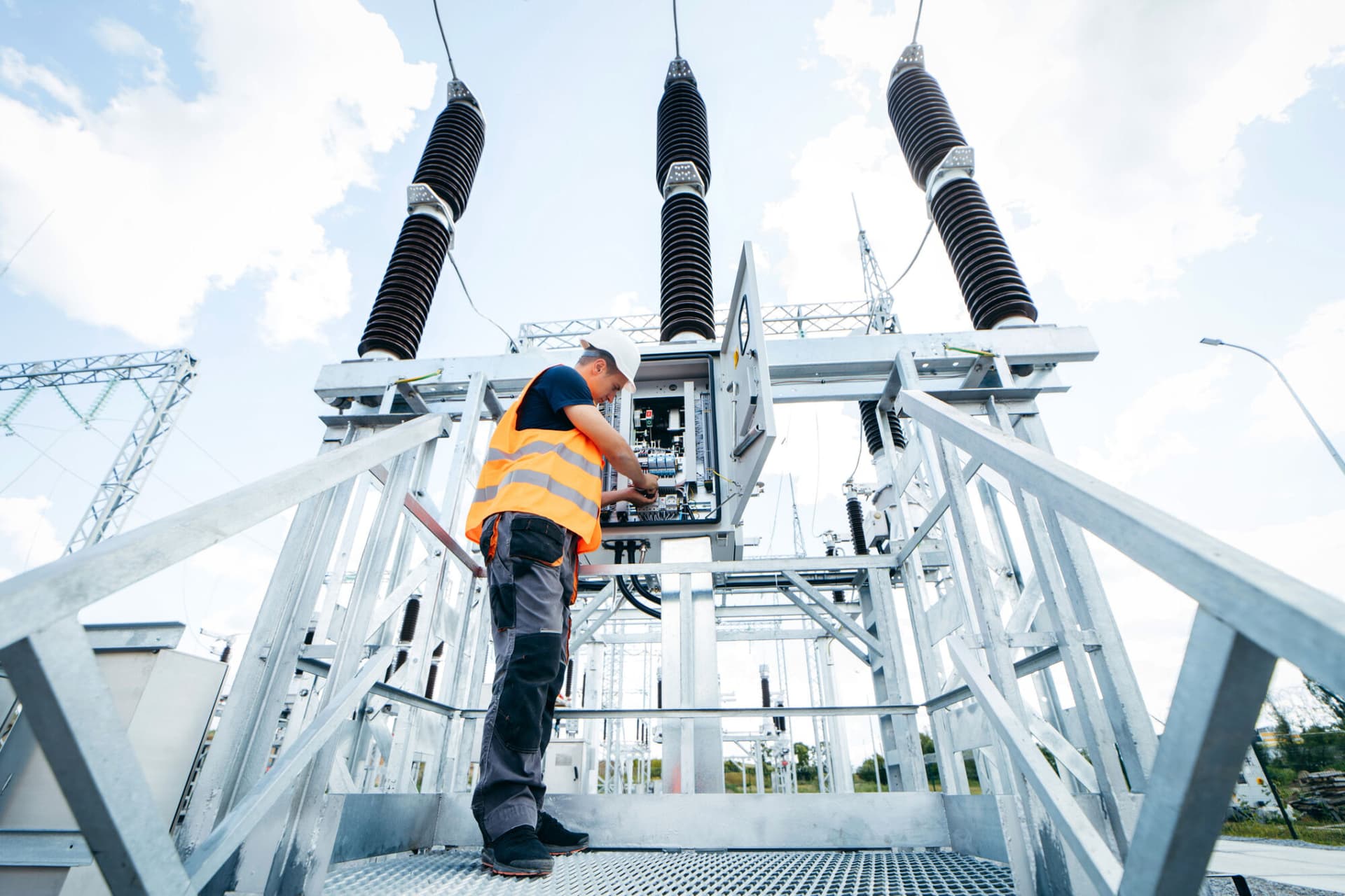 Electrical engineer inspect electrical systems at the equipment control cabinet
