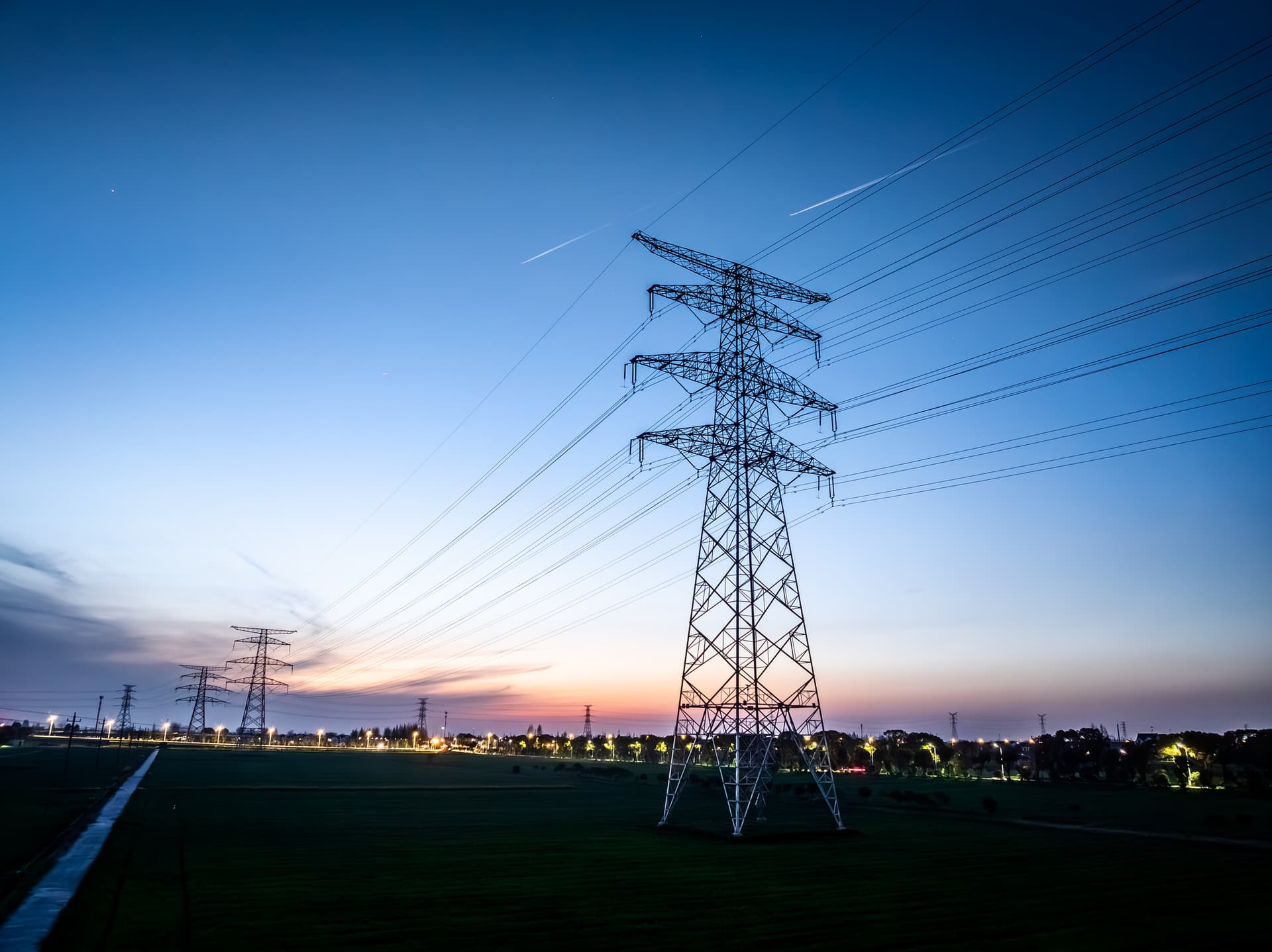 High voltage electricity tower landscape Getty