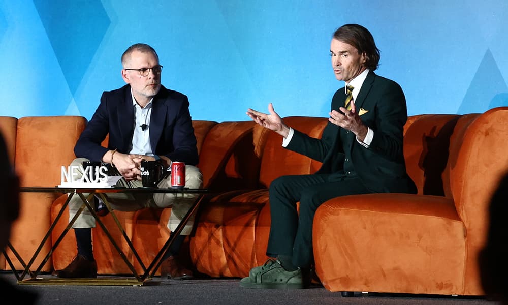 Hellman & Friedman CEO Patrick Healy chats with PEI Group's Philip Borel at Nexus 2026.