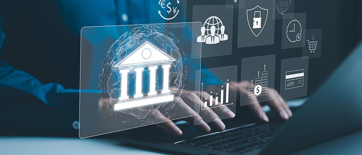 Close up shot of hands typing on a laptop with overlays of digital banking icons