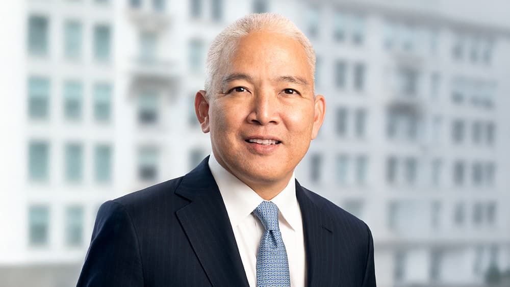 Headshot of Ian Fujiyama, Carlyle
