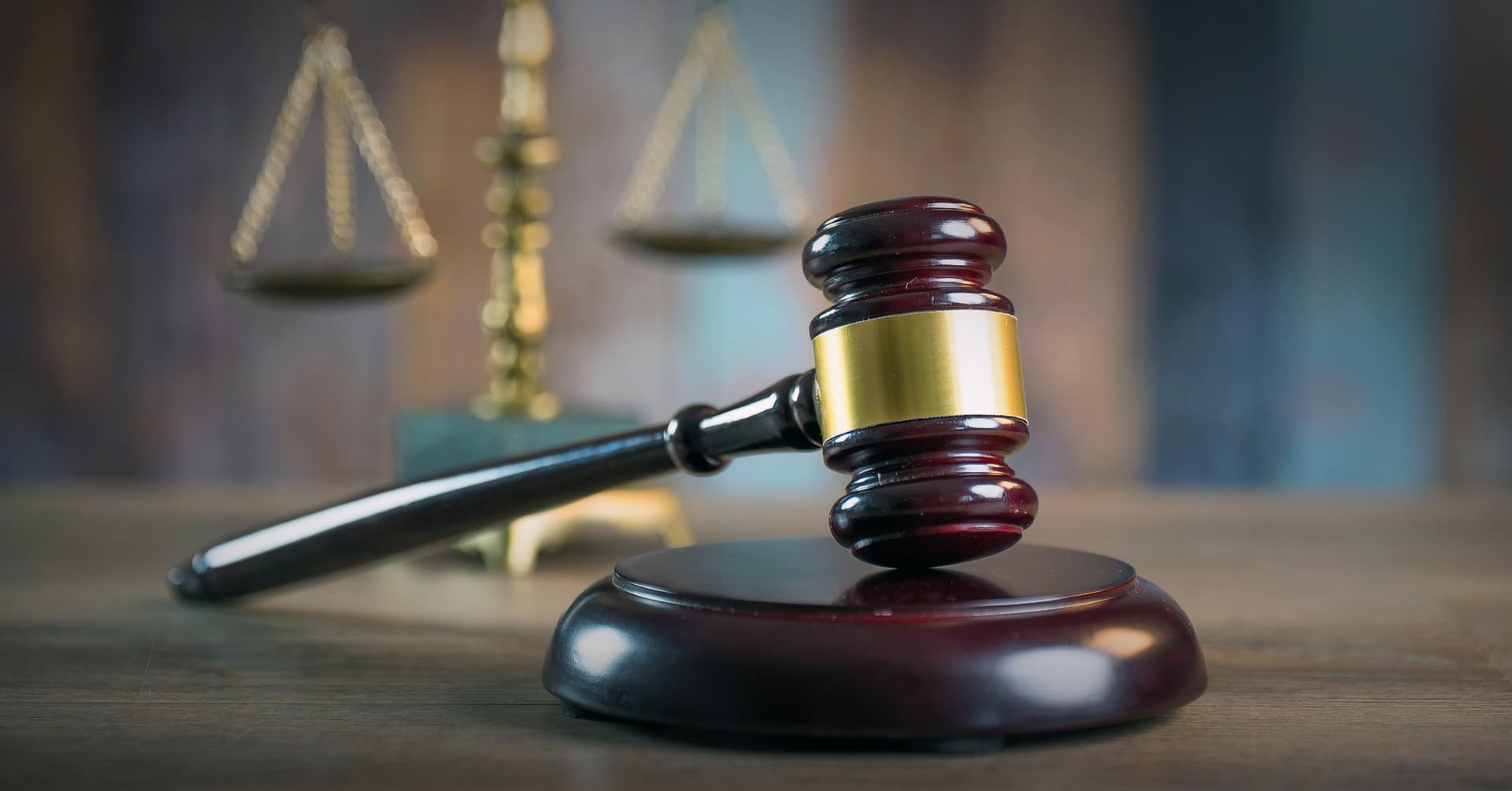 gavel with scales in background