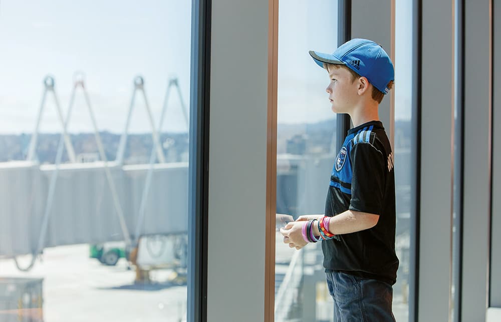 A boy looking out of a window