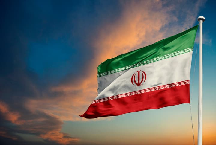 Iran flag at dusk