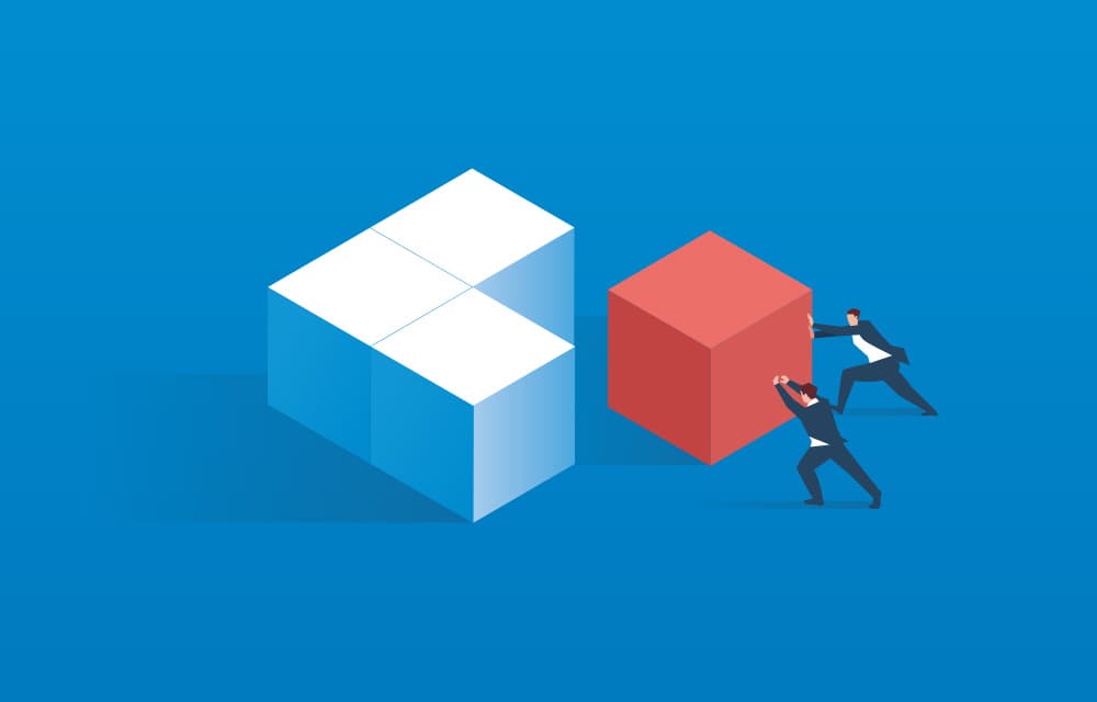 People fit cube into shape