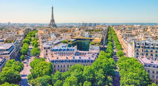 Paris skyline against a blue sky