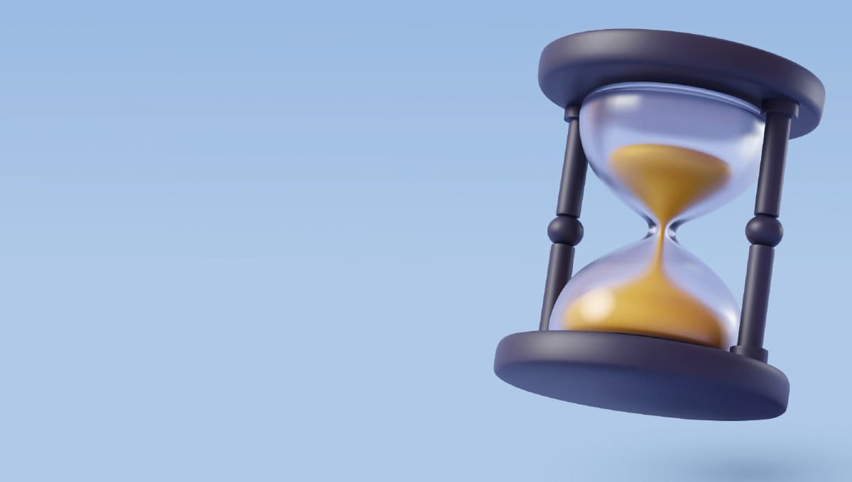 Hour glass on a sky blue background