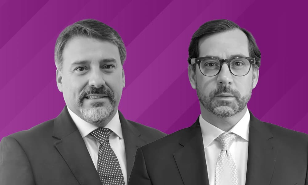 Eduardo Ramos and Marco Peschiera against a purple background