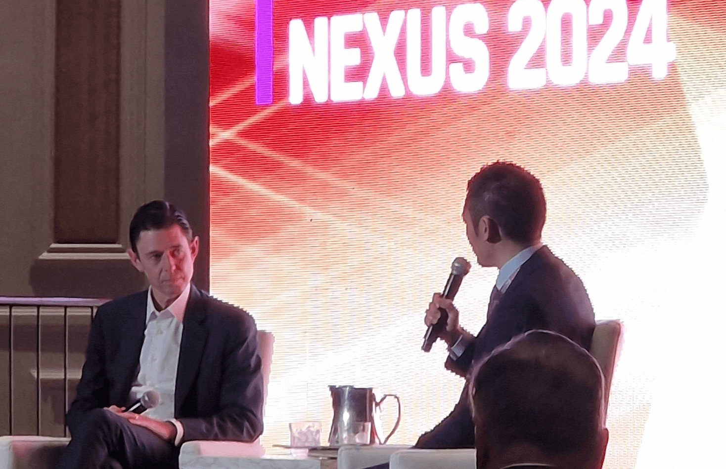 Scott Nuttall and Adam Le on stage at NEXUS 2024