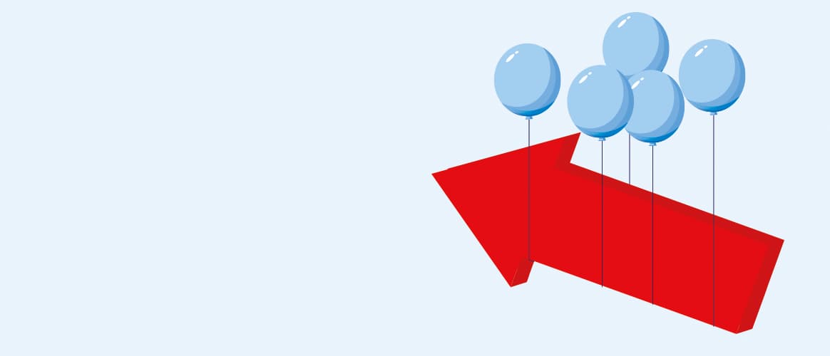 Balloons lifting up a big red arrow