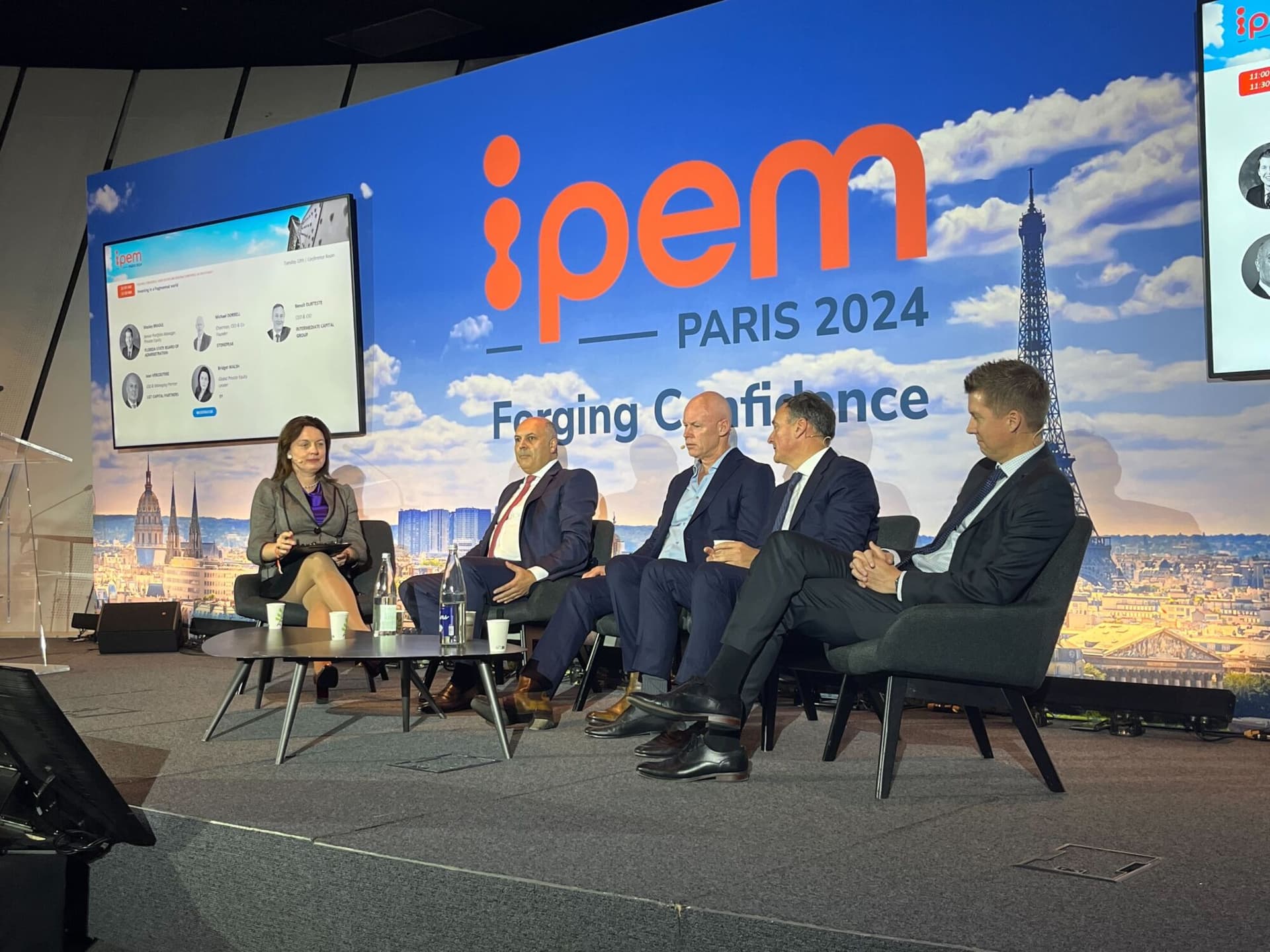 Panellists speaking onstage at IPEM Paris 2024