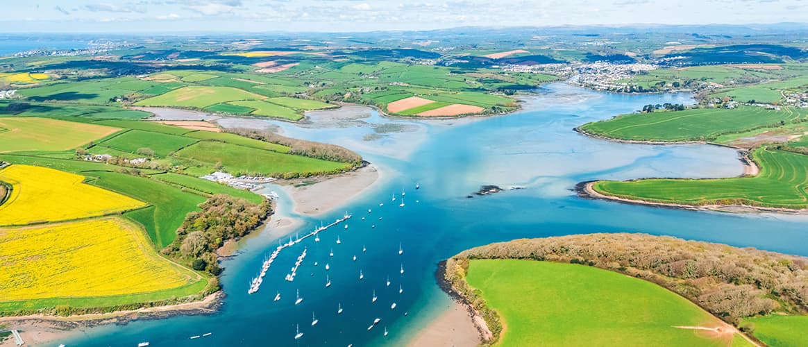 Boats moored in the estuary of Salcombe in Devon