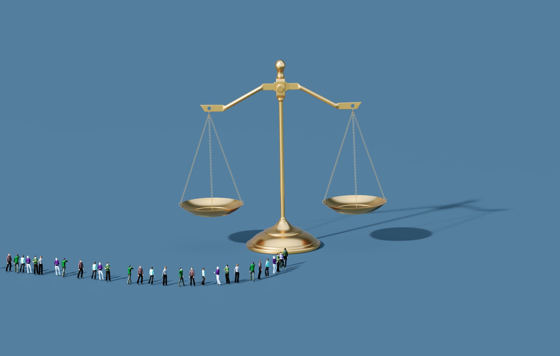 A line of people waiting to approach a giant justice scale