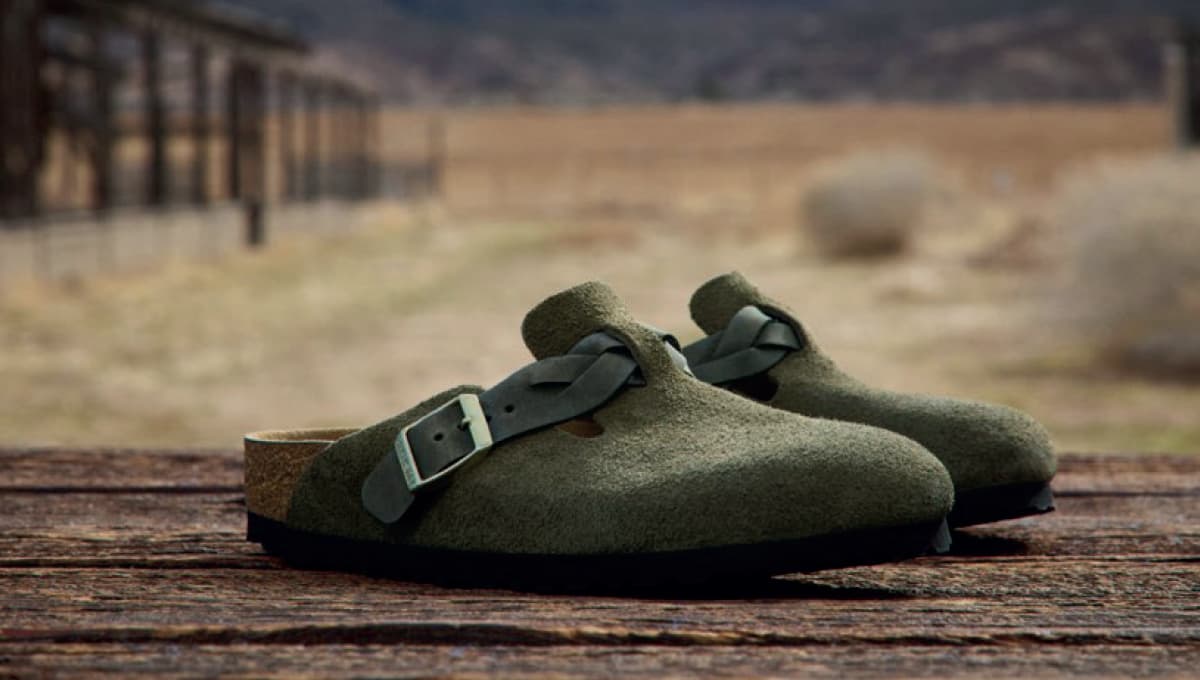 Birkenstock shoes on a wooden deck