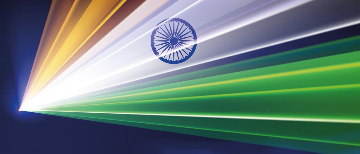 A spotlight shines in the colours of the Indian flag