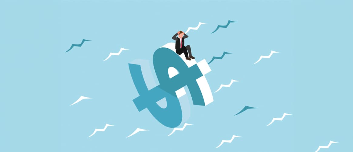 Dollar life raft with a businessman sitting on top of it clutching his head in despair