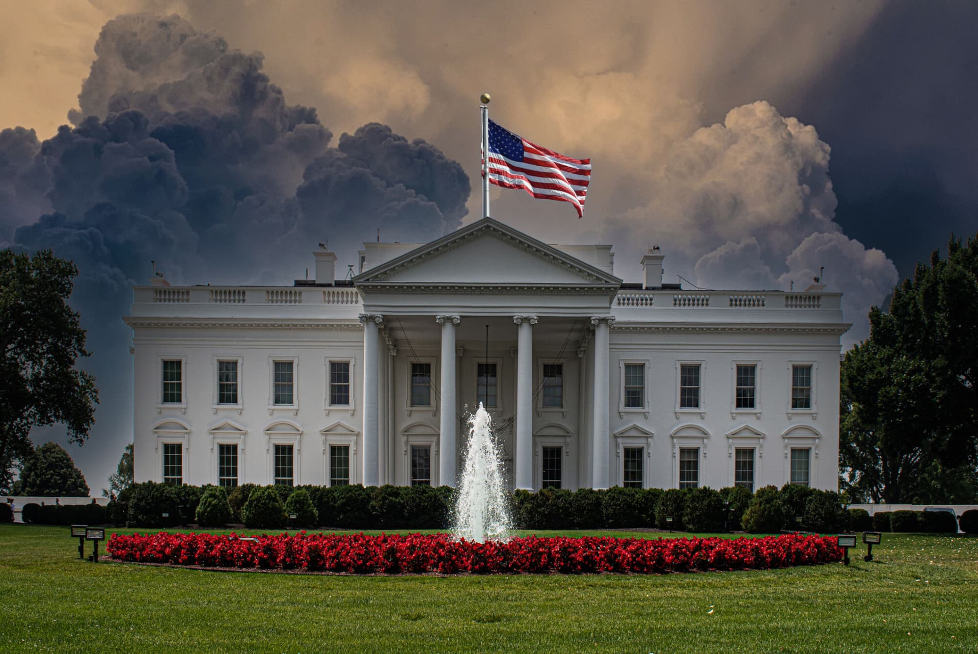 The White House with a stormy sky above.