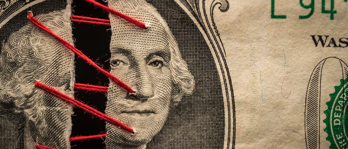 PEI Feb26 cover image torn US dollar bill