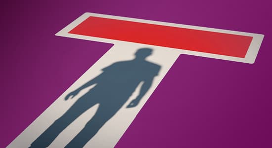 Shadow in a doorway with a no-entry sign on it
