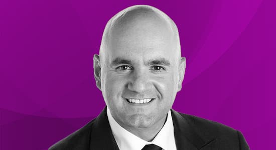 Headshot of Adam Buzanis