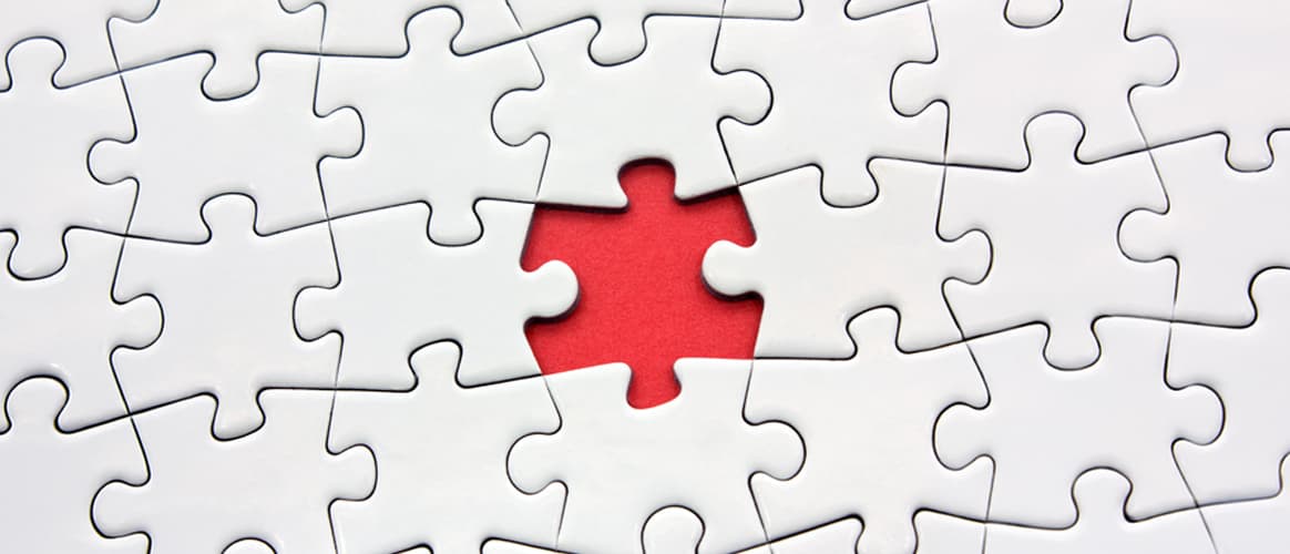 Red puzzle jigsaw missing piece