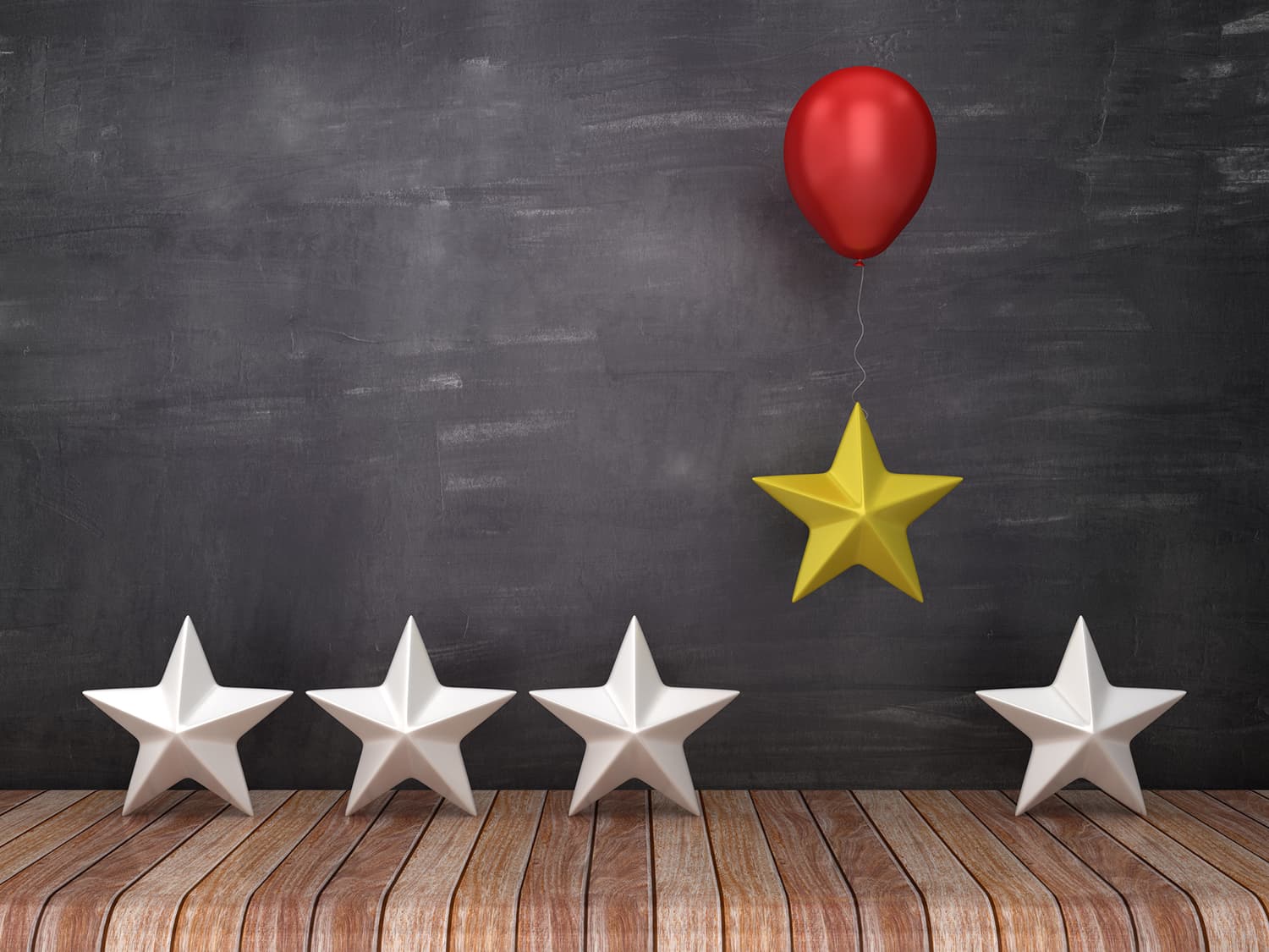 Stars with red balloon lifting one against a chalkboard background