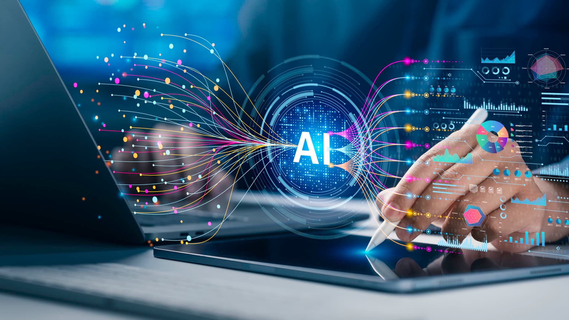 Image of a digital AI button hovering over a laptop, symbolizing the synthesis of data.